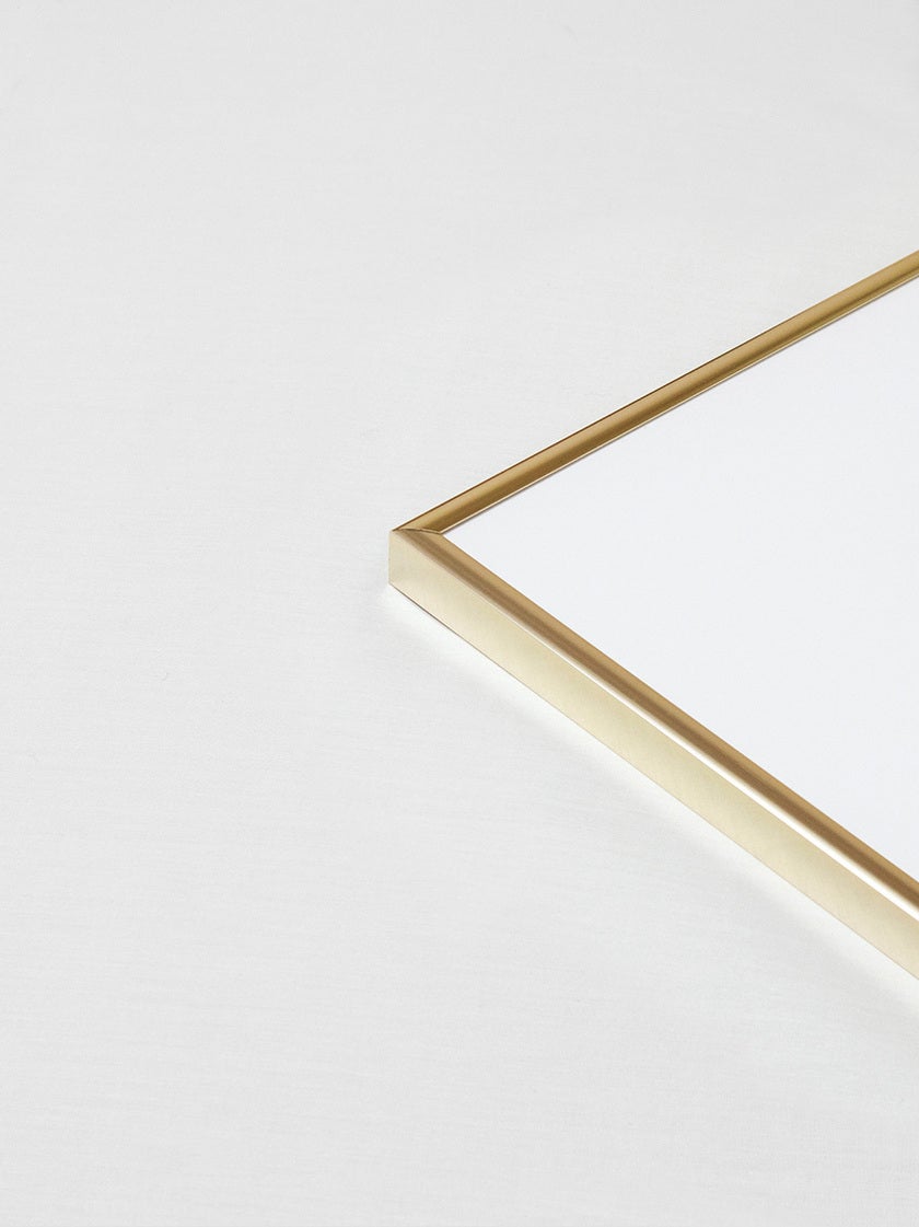 Gold effect metal frame